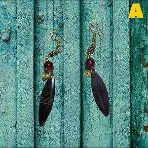 Handmade in Kenya. NOTE: Please choose each earring according to letters.